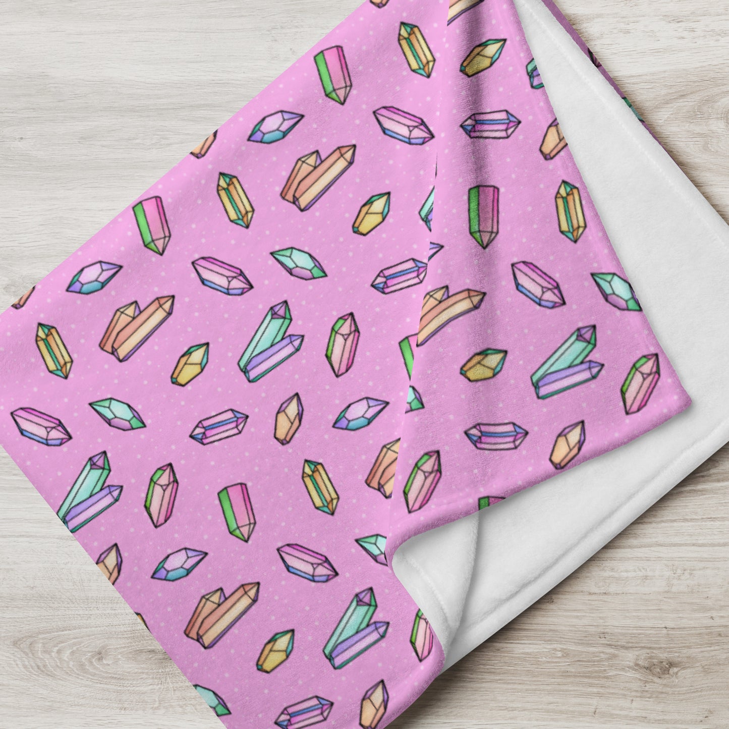 folded view of 60" x 80" Crystals most Mystical throw blanket in pink