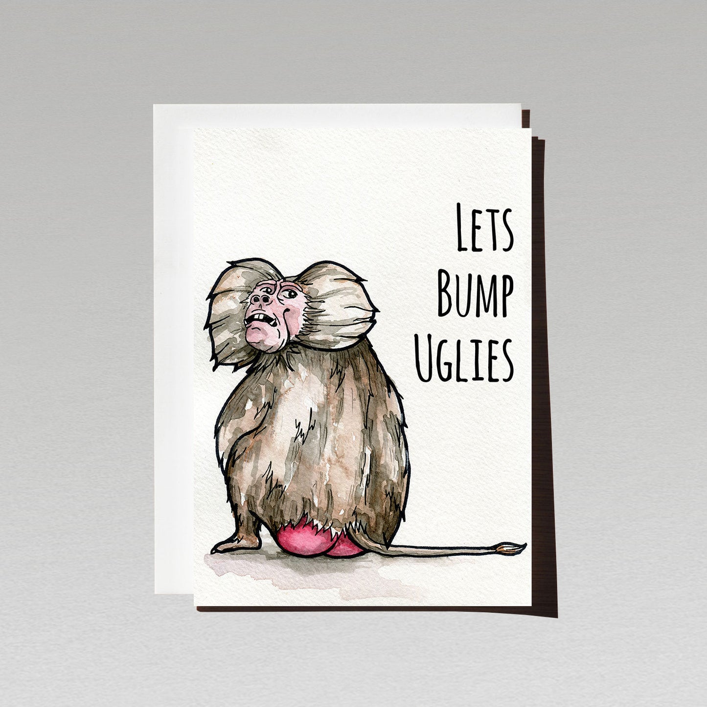 Ugly Baboon sitting with back and red bottom to front looking over its shoulder on white background with text Lets Bump Uglies