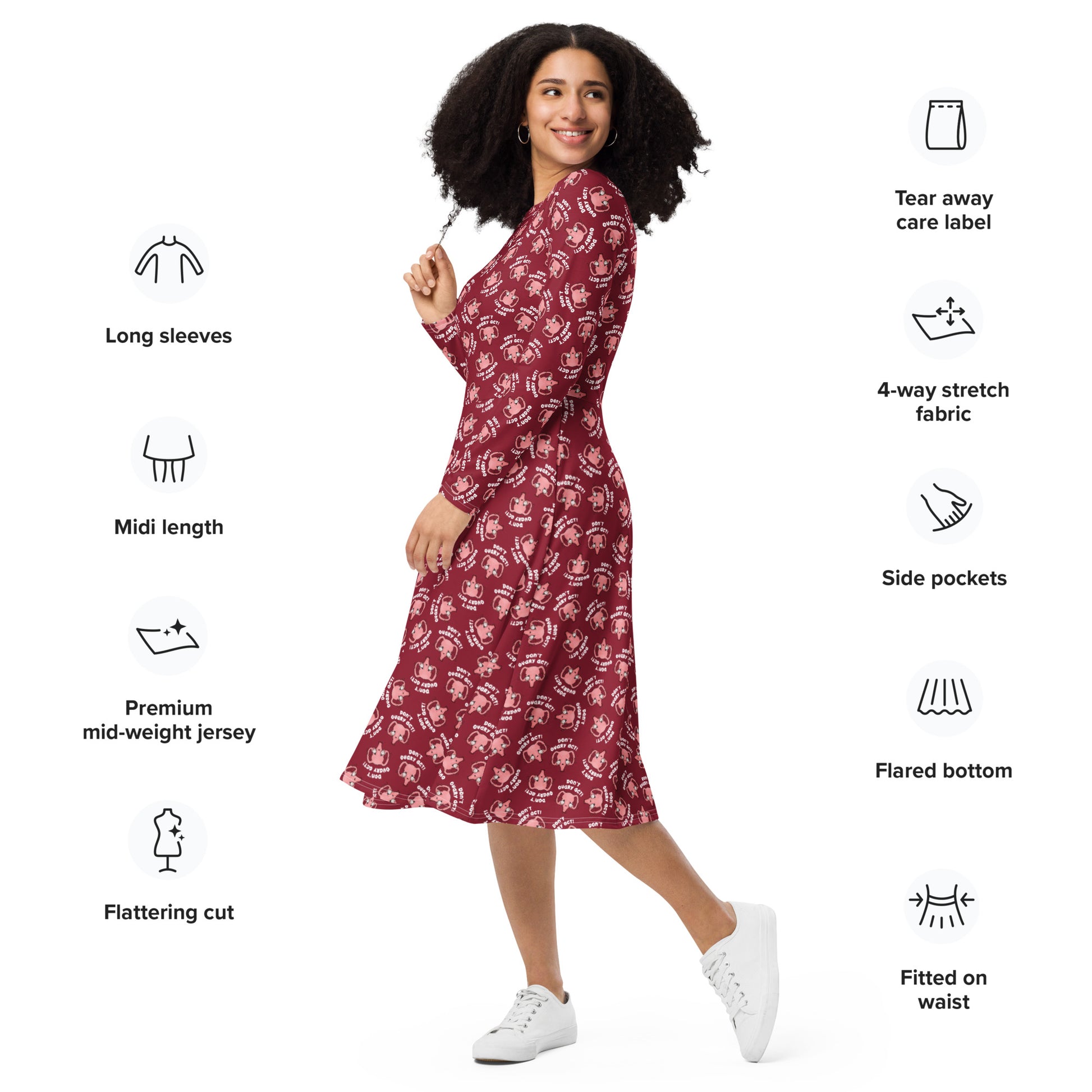 Don't Ovary Act dress in red showing with labels: Long sleeves, midi length, premium mid-weight jersey, flattering cut, tear away care label, four way stretch fabric, side pockets, flared bottom and fitted on waist