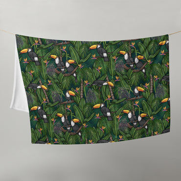 image of 50" x 60" blanket hanging in half on a clothes line to show size with Toucans in the jungle pattern