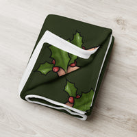 folded view of 50" x 60" Jingle Balls throw blanket in forest green
