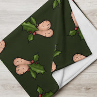 folded view of 60" x 80" Jingle Balls throw blanket in forest green