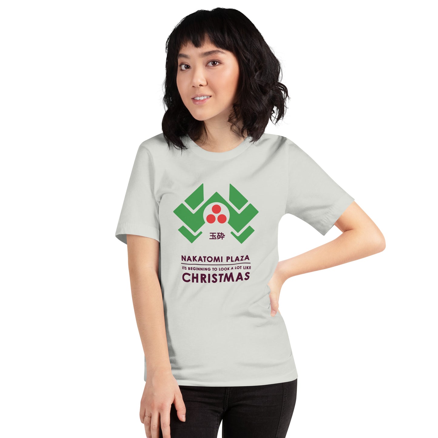 Silver t-shirt version of Nakatomi Plaza Die Hard t-shirt on a female body