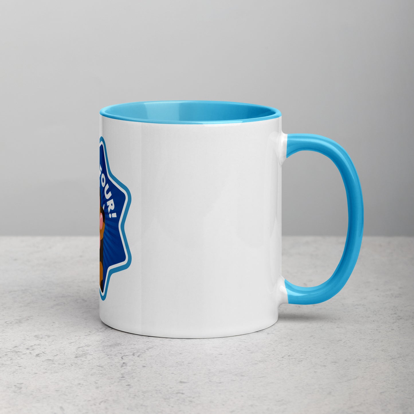 right hand facing image of a white mug with blue interior and handle. Mug has image of a tortoiseshell cats paw on a blue 8 sided star with the text 'give me four' 