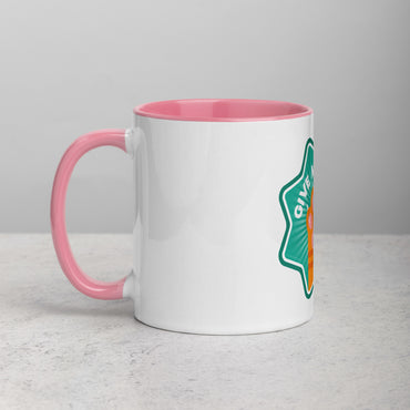left hand facing image of a white mug with pink interior and handle. Mug has image of a ginger cats paw on an aqua 8 sided star with the text 'give me four' 