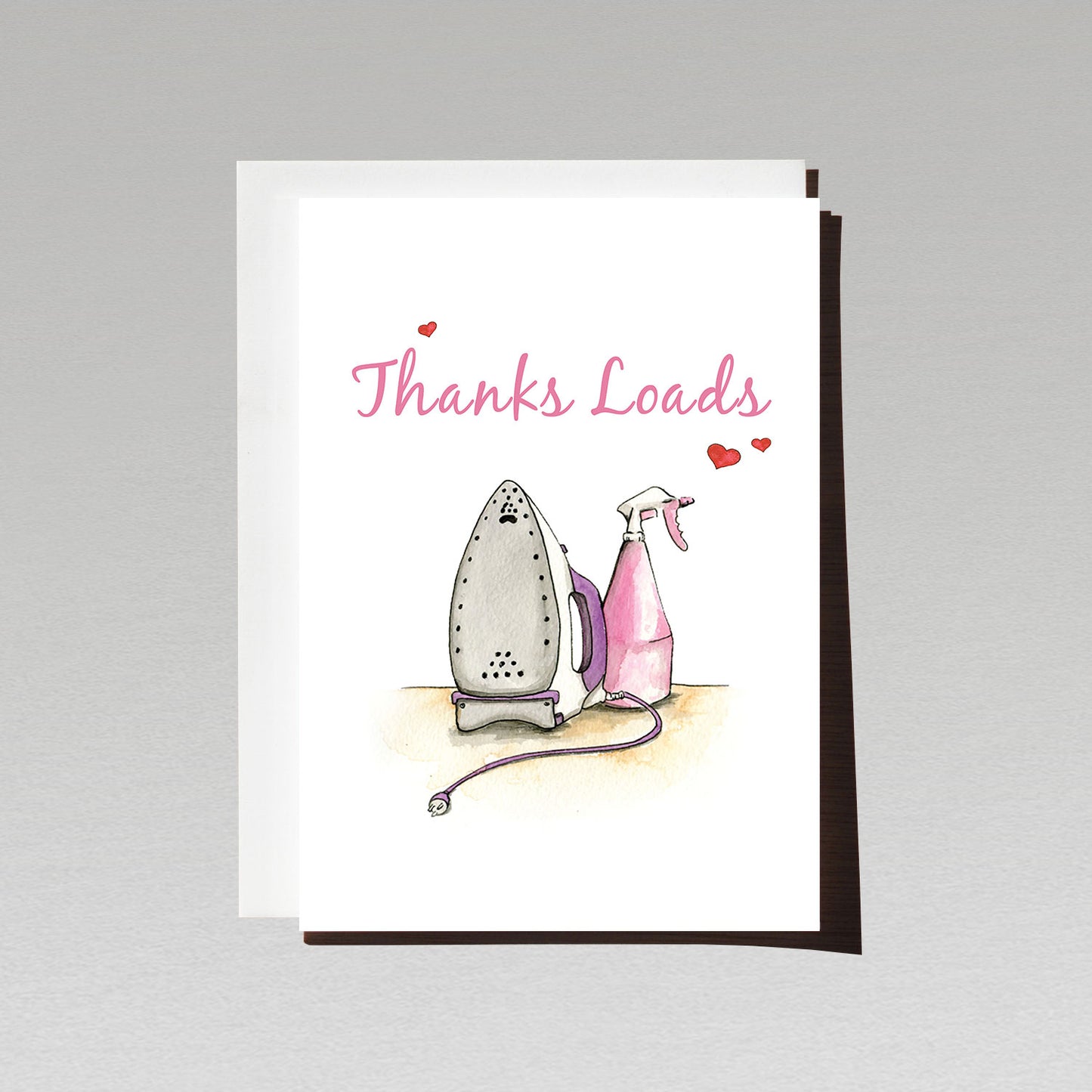 Greeting card with illustration of an iron on white background with pink text Thanks loads