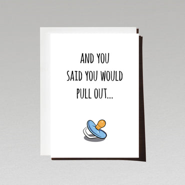 pregnancy reveal greeting card with blue pacifier on white background with text and you said you would pull out