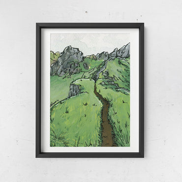 Grass ridgetop landscape study in watercolor, gouache and ink painting from Joan and Rose shown hanging in a frame on a wall 