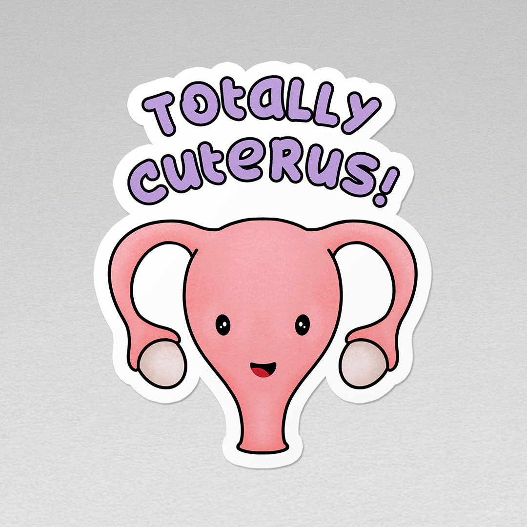 image of a smiling uterus with the words totally cuterus in purple vinyl sticker with white border